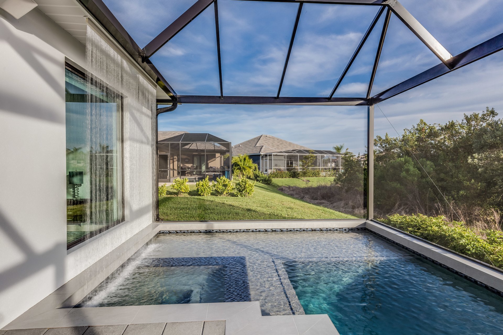 Beautiful pool area with waterfall